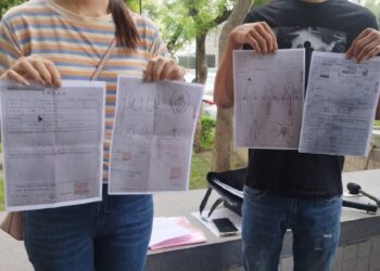 ▲受害家長提出女童驗傷單，女童有外陰紅腫，並出現排尿困難。（圖／記者陳立驌攝）