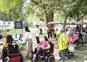 ▲高雄市傷殘服務協會於台糖高雄花卉農園中心舉辦45週年慶活動，結合烤肉聯誼與闖關遊戲，吸引上百名會員、家屬及民眾參與。（圖／高雄市傷殘服務協會提供）